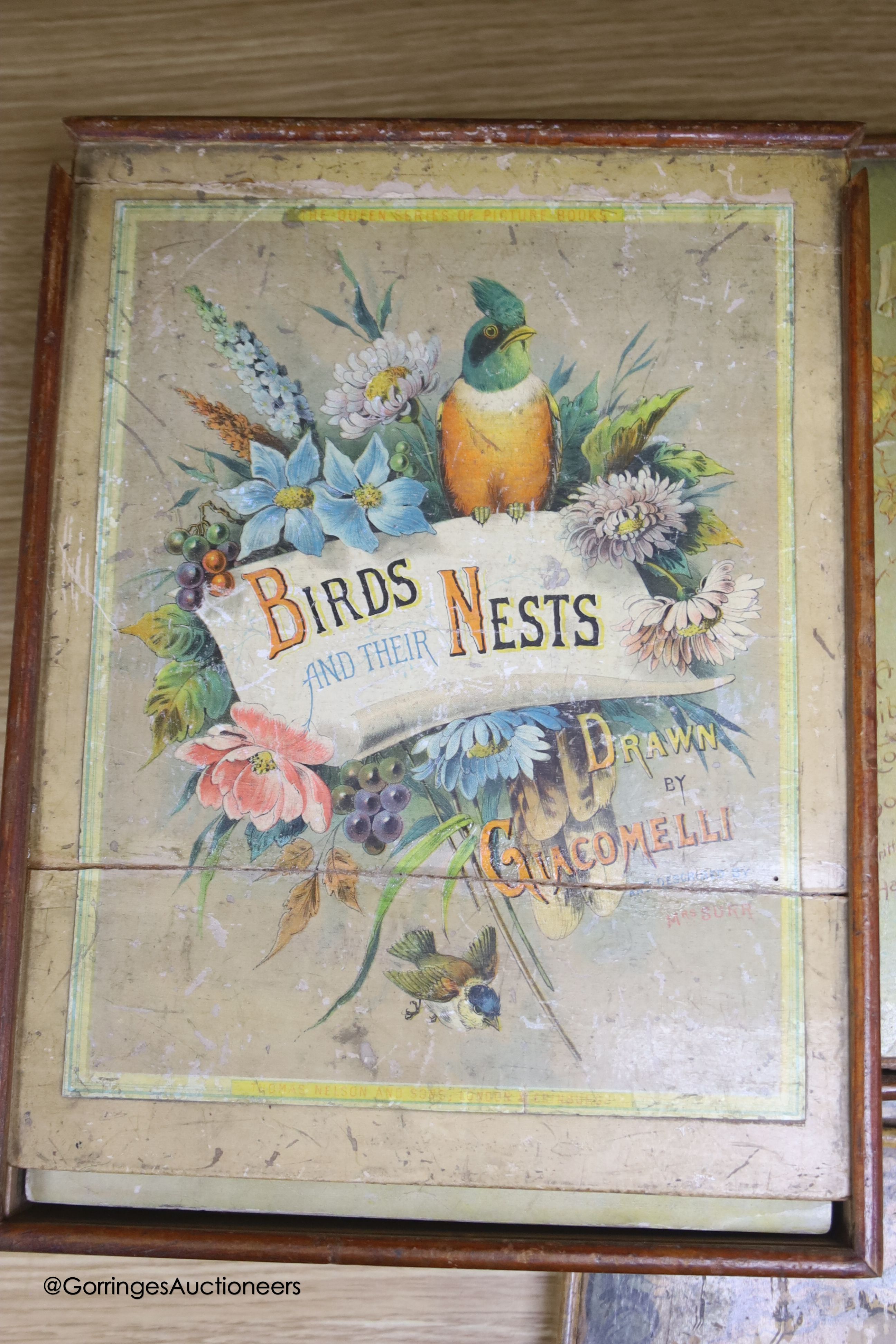 Five Edwardian boxed jigsaw puzzles, to include the history of printing, birds and their nests, biblical subjects, etc